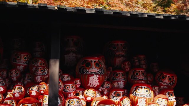 Numerous japanese daruma dolls at katsuoji temple