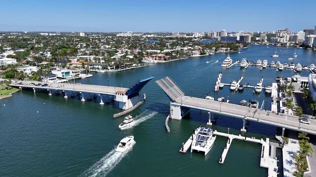 Boats passing through Las Olas Blvd drawbridge at Fort Lauderdale Beach in Broward County, Florida. 