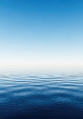 Obraz premium A calm, wide expanse of water meeting a clean, minimalist horizon under an empty sky. This peaceful, blank scene suggests potential and tranquility, horizon, clean, vast