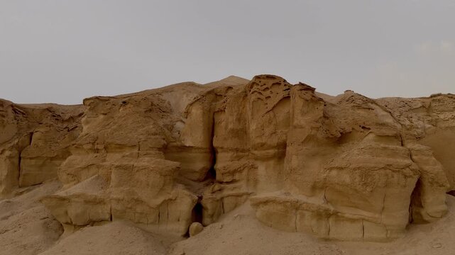 Drone push forward and pull back desert mountain shot