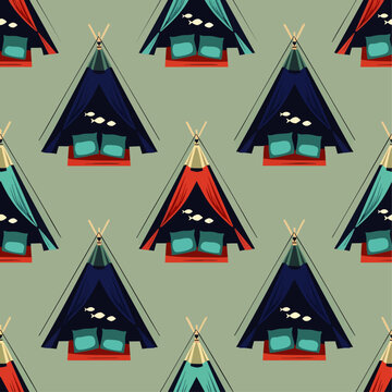 Seamless pattern of colorful teepee tents with beds and fish motifs on a muted green background