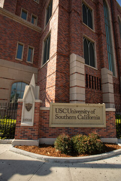 Los Angeles, California, USA - March 22, 2026: A sign for USC decorates the eastern edge of Fertitta Hall.