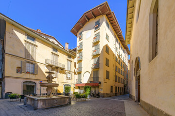 Obraz premium The Fontana del Gombito, a historic stone fountain on the main street of Via Gombito in the Città Alta Upper Town of Bergamo, Italy