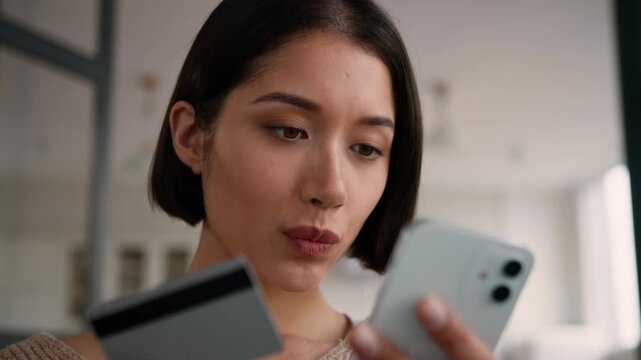 Happy Hispanic woman at home smiling using smartphone online shopping pay buyer shopper girl lady female user buy consumer goods payment internet bank app store mobile phone credit card order delivery