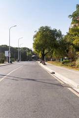 Naklejka premium Empty urban road and buildings in the city