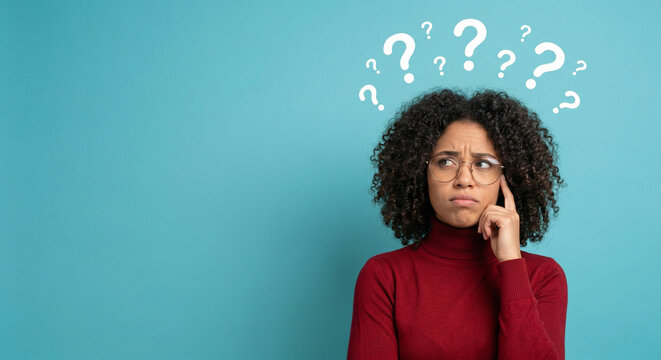 Woman with question marks thinking face.