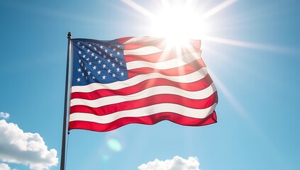 Fototapeta premium American Flag Waving Proudly in the Bright Sunlight.