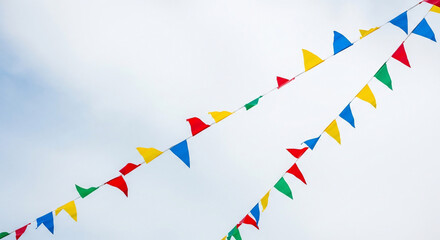 Obraz premium Colorful triangular pennant flags hanging.