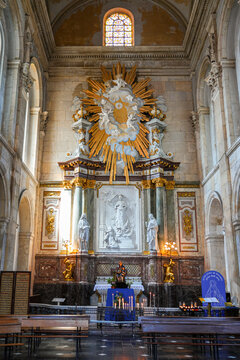 The monumental high altar and golden "Glory" with angels inside the Basilica of Notre-Dame in Boulogne-sur-Mer, Pas-de-Calais, Northern France