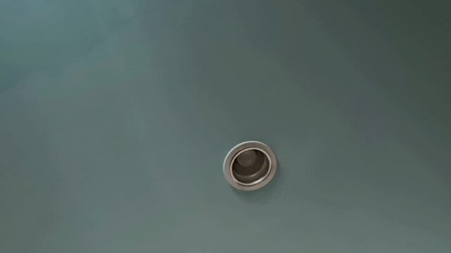 Ceiling light trim ring embedded in the ceiling