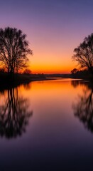 Fototapeta premium Serene Lake at Sunset with Reflections.