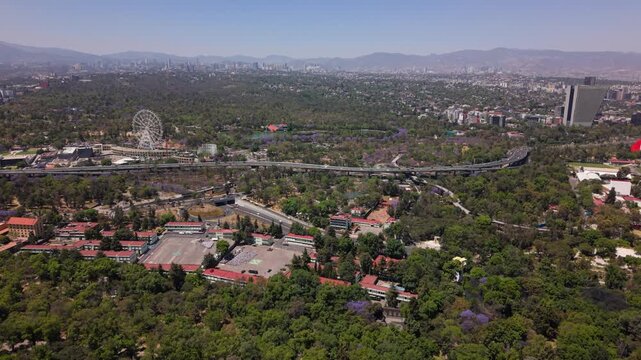 Wide aerial of Chapultepec forest and modern buildings in Mexico City