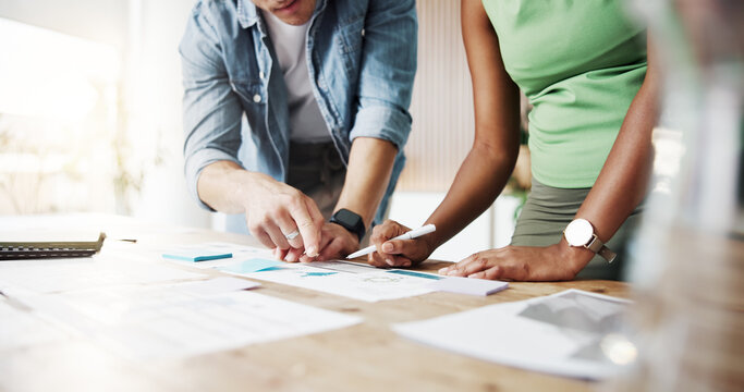 Business people, hands or discussion with documents in office for schedule planning, tasks or ideas. Businessman, woman or employees pointing with paperwork for performance or review in workplace