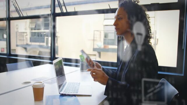 Woman shifting from laptop typing to tapping phone starting business call while glass showing icons
