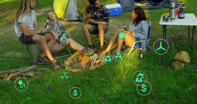 Friends sitting around campfire with guitarist strumming causing green icons visualizing energy
