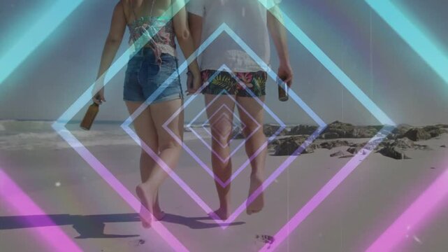 Shot rear-view pair walking to sea leaving prints bottles neon diamond pulsing over pair for travel