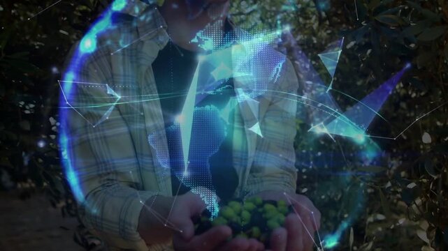 Orchard grower presenting fruit, camera moving, digital globe forming around hands showing agtech