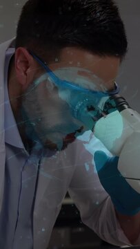 Aligning eyepiece, scientist peering into microscope at lab, adjusting focus with blue gloves globe