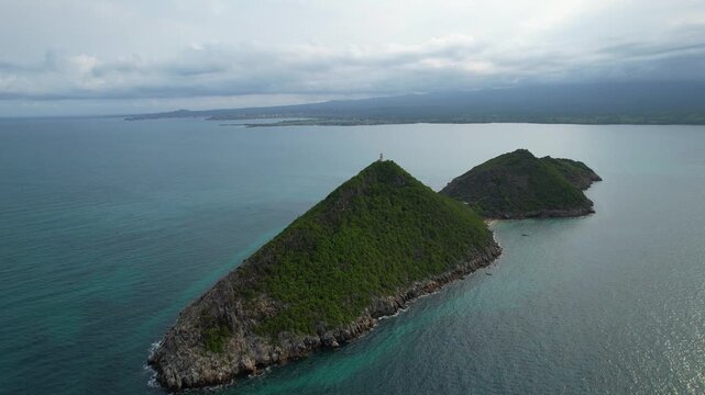 Panoramic drone shot around the Lighthouse on Ilh&eacute;u das Cabras Islet, Sao Tome