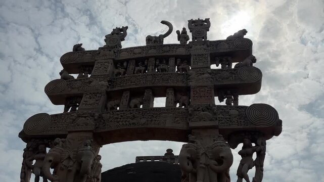Silhouette of Northern Gateway of The Great Stupa, Sanchi, India. Close up, low angle