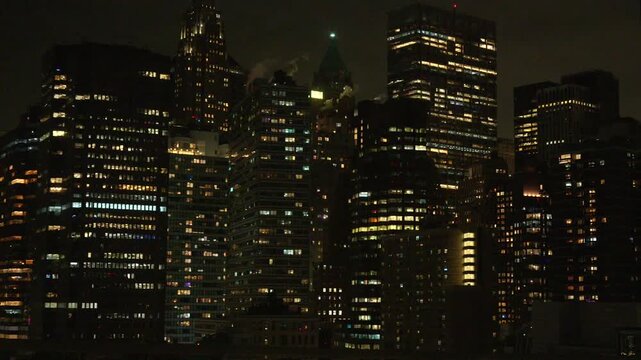 Close night view of Lower Manhattan skyscrapers in New York