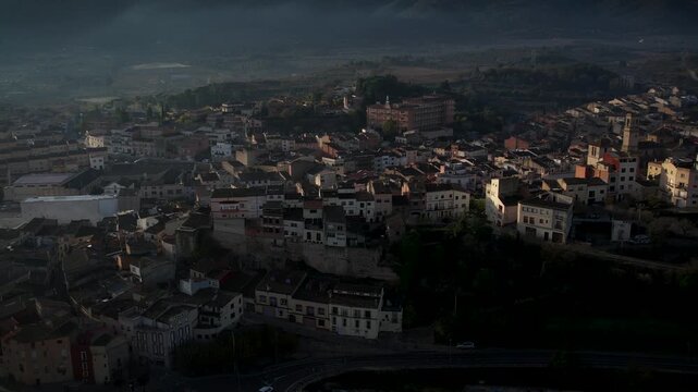 Footage of Espluga de Francoli town in Catalonia with sunrise and mountains in the back. High quality 4k drone footage