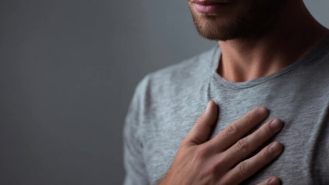 Inner Calm & Reflection: A person gently touches their chest, expressing a deep sense of peace, meditation, and introspection. This evokes tranquility.