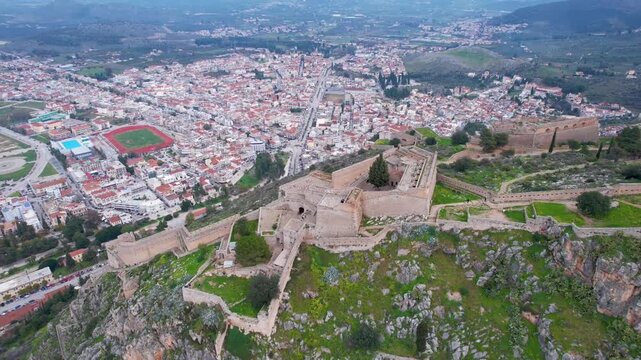 Drone footage reveals the historic palamidi fortress overlooking the coastal city of nafplio, greece