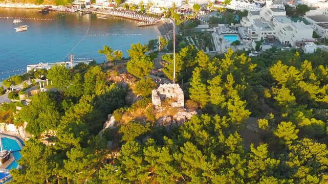 Bodrum, Turkey. Aerial drone view of Tiger Tower, part of Bodrum Castle's ancient defense network. Hilltop watchtower built by Knights Hospitaller for coastal protection.. Aerial View, MasterShots, C
