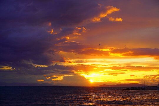 A colorful sunset from the shore of Glyfada, Greece