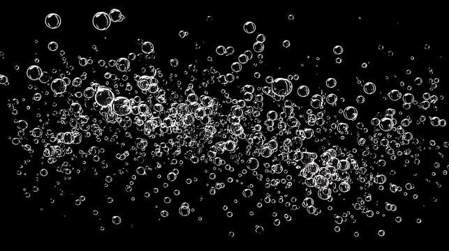 Small clear air bubbles dispersed in a wide cluster against a solid black background texture