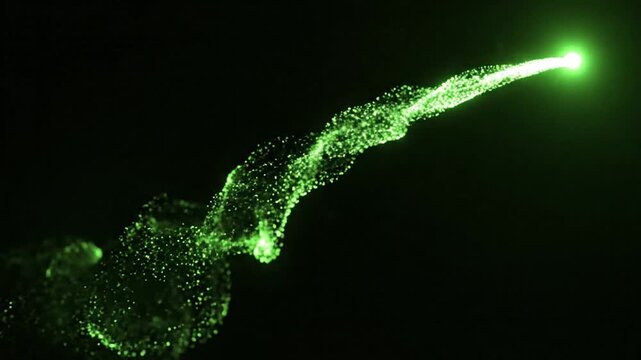 Ethereal glowing green particle trail animation featuring luminous light specks moving in fluid curve motion against a dark background, cinematic 4K video element for visual effects design.