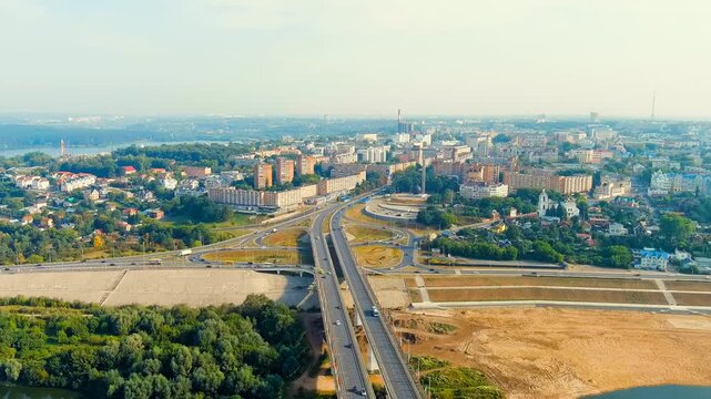 Kaluga, Russia. Entrance to the city center of Kaluga Gagarin interchange and Gagarin bridge. Drone footage, Departure of the camera