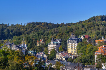 Obraz premium Panoramic view of Karlovy Vary with Russian Orthodox Church, Czech Republic. Historical town under clear blue sunny sky