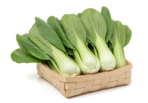 A bunch of bok choy in a wicker basket