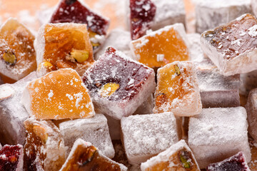 Sweet food Turkish delight, assorted rahat locum in form of cubes with nuts and powdered sugar, traditional food