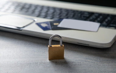 Naklejka premium Padlock with a credit cards and computer keyboard. Credit card security