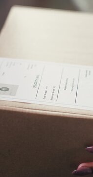 Package, label or hands with box for supply chain, priority shipping or mailing address for delivery. Tracking number, courier info or person with postage sticker for order, parcel details or startup