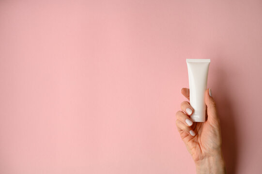 A white empty tube for cream, paste, gel, or shampoo as a mockup. An empty cosmetic tube