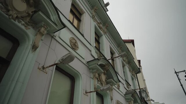 The facade of an old historical building in the center of Moscow. Shot list