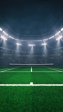 Grass tennis court at a sports arena with glowing spotlights and fans ready for the upcoming night sporting event.