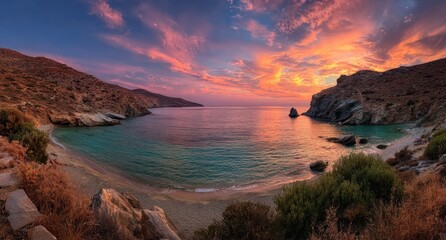 Obraz premium Panoramic bay view at sunset, showcasing vibrant sky, calm water, and rocky coastline