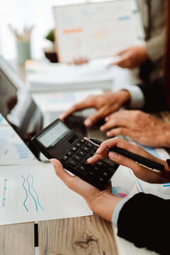 The financiers are calculating personal taxes for their customers.