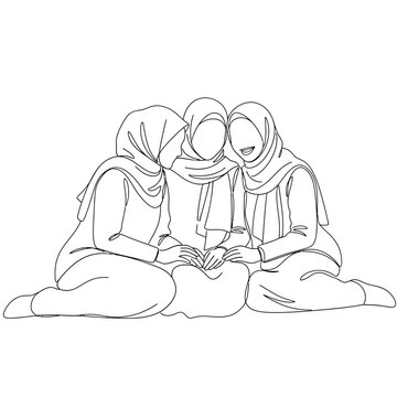 Three women wearing headscarves sitting together.