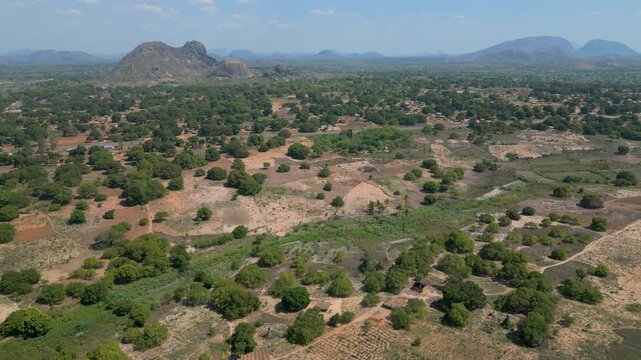 Aerial over scenic Mozambican landscape surrounded by unusual mountain like granite hills, or inselbergs in Nampula province.