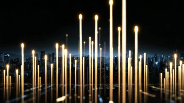 Tall lights extend upward in a dark city, illuminating the skyline with a bright show against the night backdrop