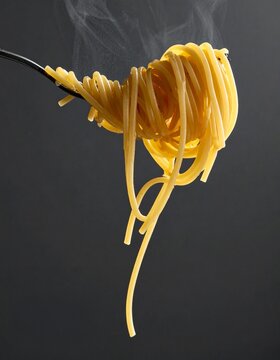 Closeup of Spaghetti Twirled on Fork with Steam
