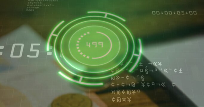 Projecting green holographic HUD showing 499 on wooden desk, with coins, smartphone, timecode