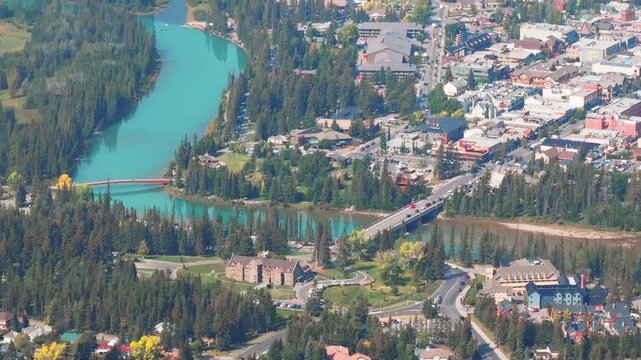 Aerial Revealing shot, Town of Banff, Morning shot. Banff National Park, Alberta, Canada.