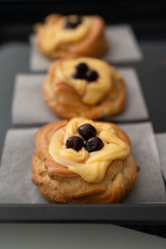 Zeppole di San Giuseppe: a traditional Italian dessert dedicated to Father's Day. They can be either fried or baked, then filled with lemon-scented pastry cream and topped with amarena cherries.